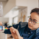 Child using technology to learn 1024x427 1